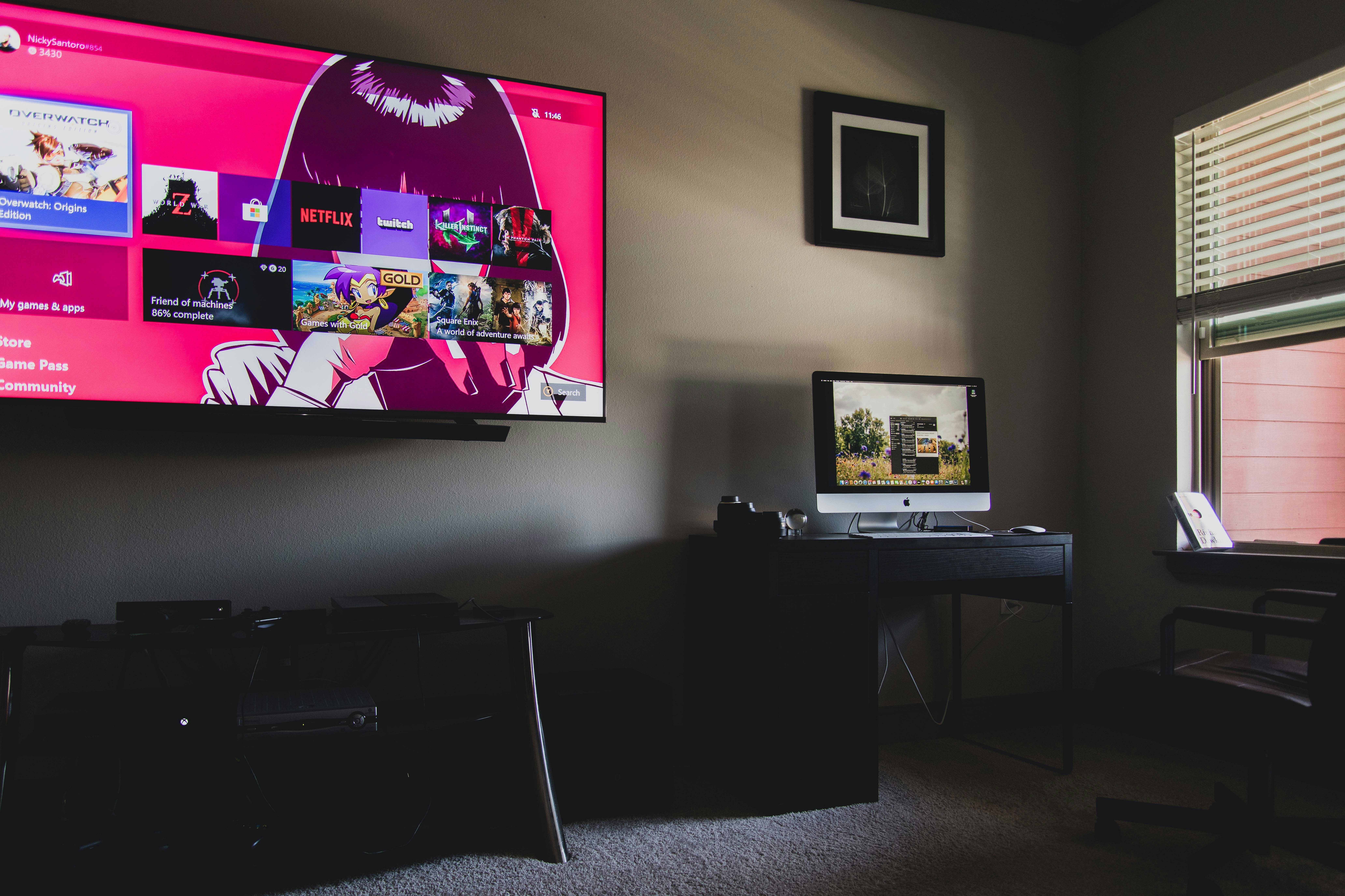 Person watching a TV in a living room