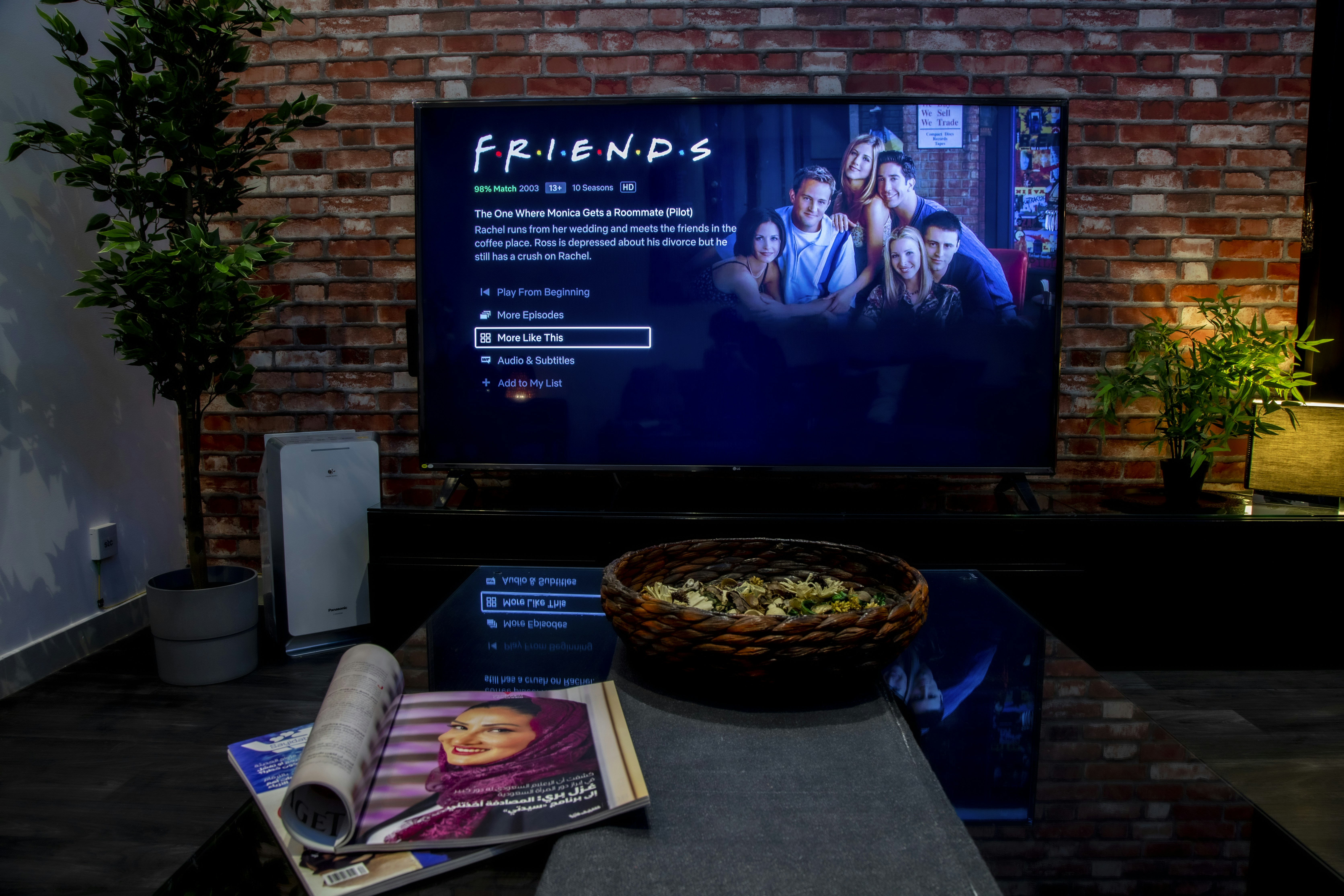 Modern living room with advanced 4K television setup